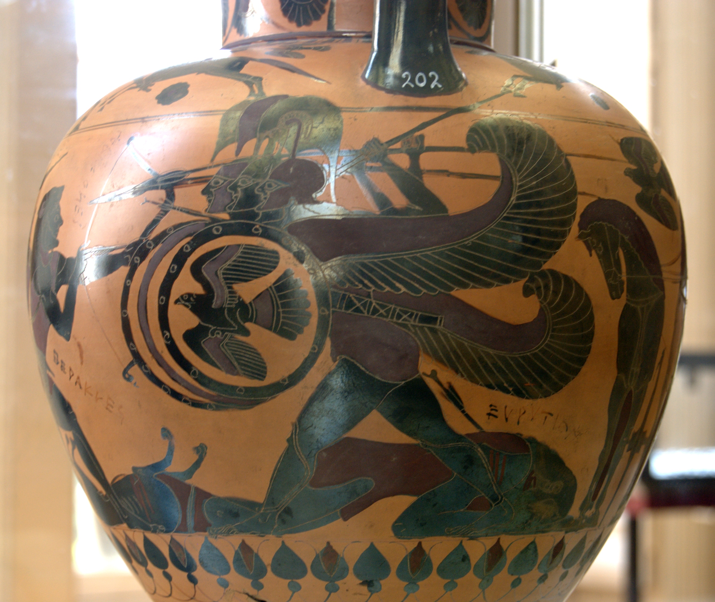 Black-figure amphora showing Heracles fighting Geryon, with Orthrus lying upside down at the lower left and Eurytion fallen beside him